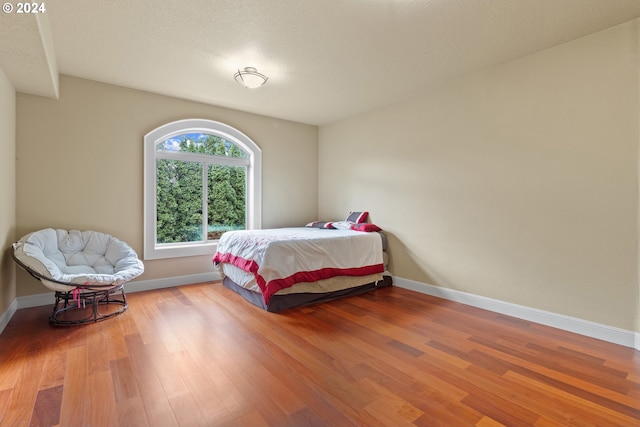 bedroom featuring light hardwood / wood-style floors