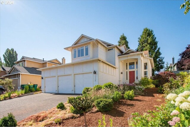 view of front of property featuring a garage