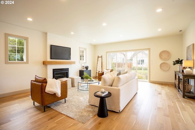 unfurnished living room with light hardwood / wood-style flooring