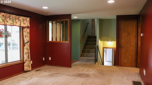 interior space with a healthy amount of sunlight and carpet floors