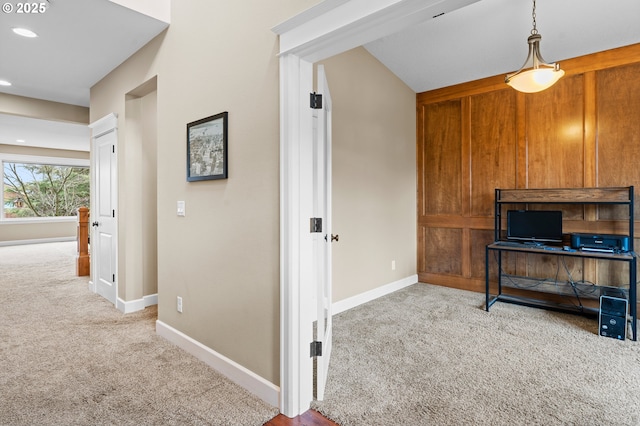 interior space featuring light colored carpet