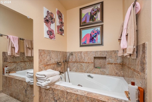 bathroom featuring a relaxing tiled tub