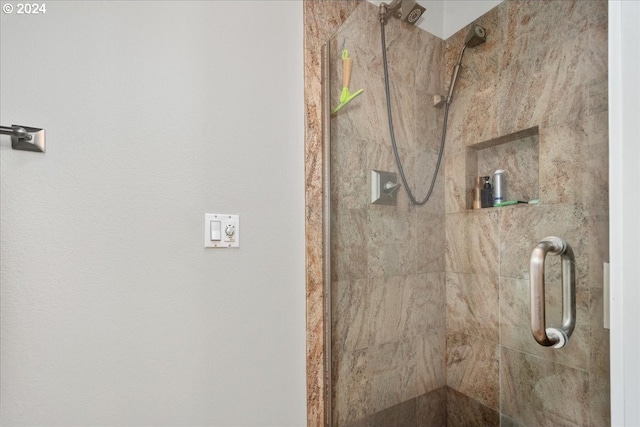 bathroom featuring an enclosed shower