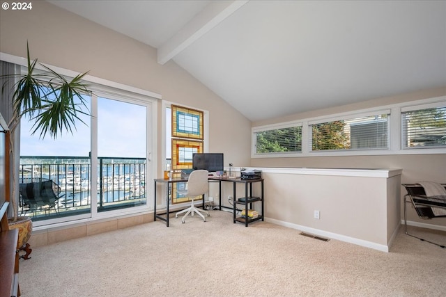 office space with vaulted ceiling with beams and light colored carpet