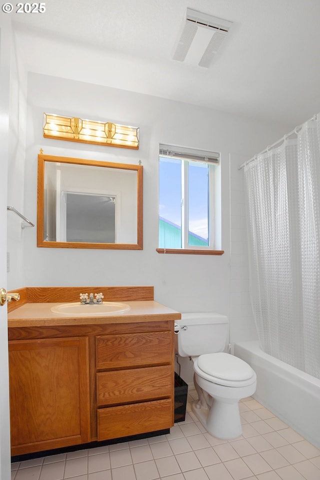 full bathroom with tile patterned floors, vanity, toilet, and shower / bathtub combination with curtain