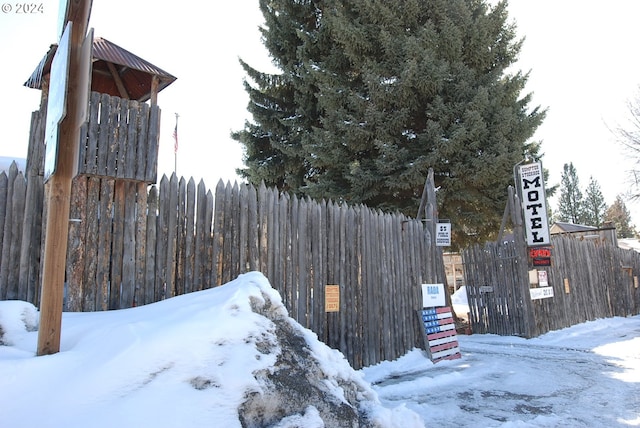 view of snow covered property