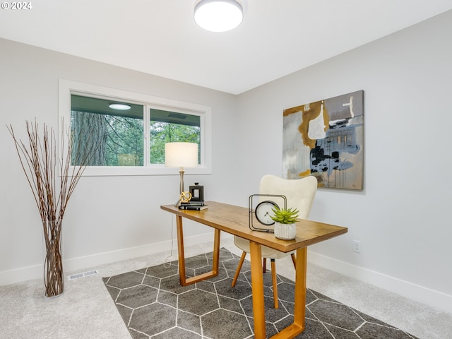 view of carpeted office space