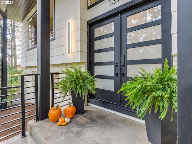 property entrance featuring covered porch