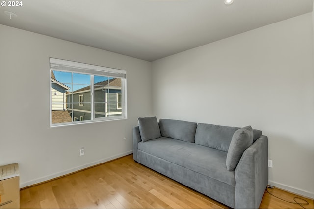 sitting room featuring wood finished floors and baseboards