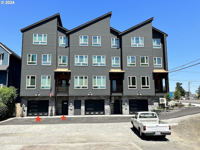 view of front of home with a balcony