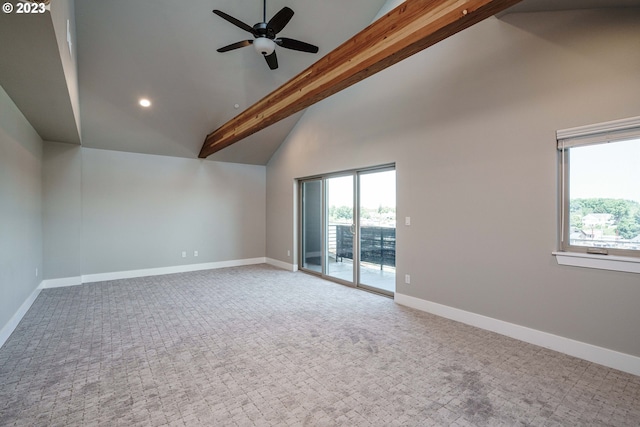 interior space featuring beam ceiling, ceiling fan, and a towering ceiling