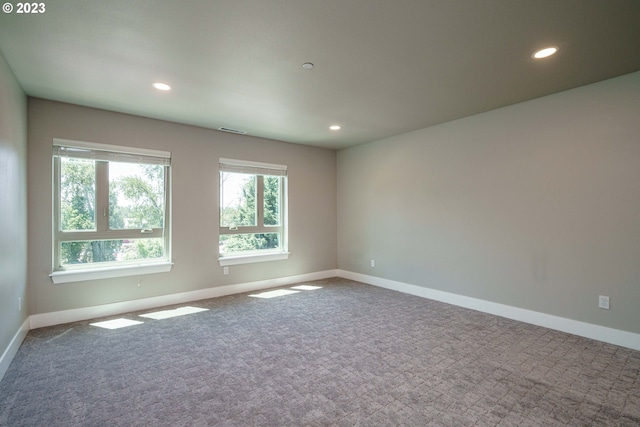 view of carpeted spare room