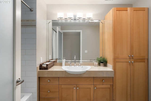 bathroom featuring shower / tub combo with curtain and vanity