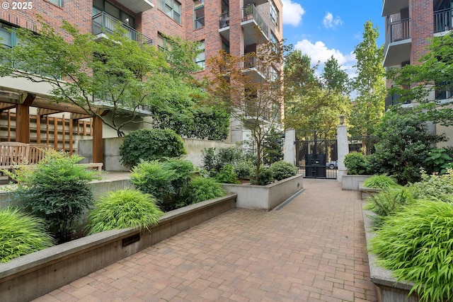 820 NW 12th Ave Unit 110, Portland, OR 97209 - view of home's community with a gate