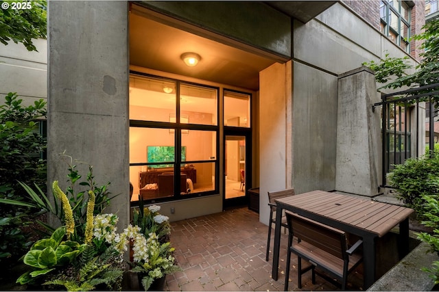 820 NW 12th Ave Unit 110, Portland, OR 97209 - view of exterior entry with outdoor dining area and a patio area