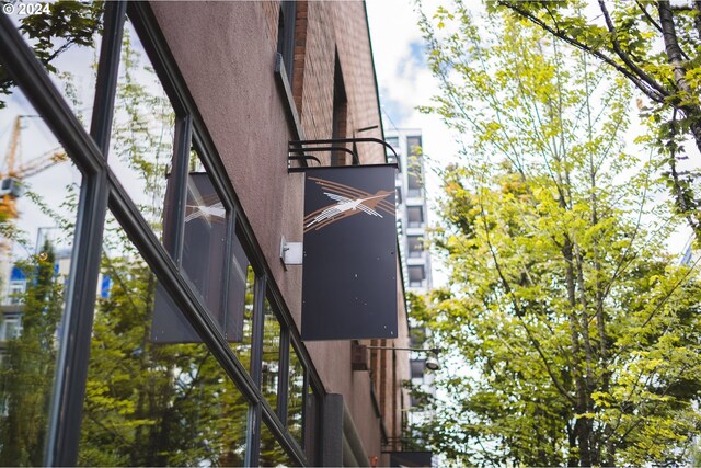 820 NW 12th Ave Unit 110, Portland, OR 97209 - exterior details featuring stairway and stucco siding