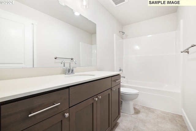 full bathroom with vanity,  shower combination, and toilet