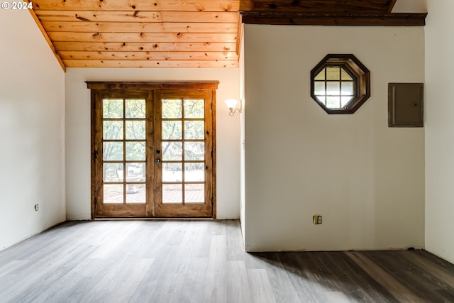 doorway to outside with french doors, vaulted ceiling, hardwood / wood-style floors, and wooden ceiling