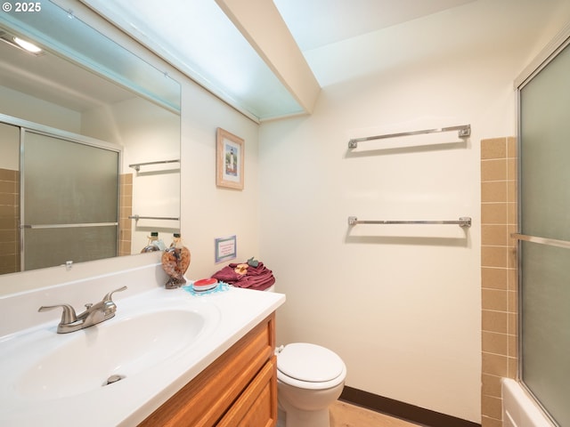 full bath with toilet and vanity