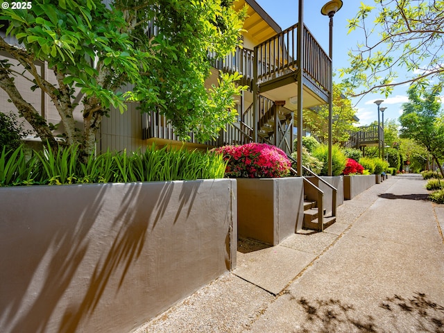 view of community with stairway