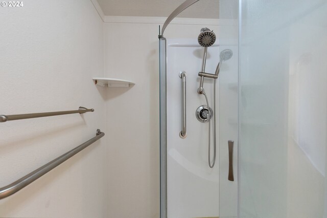 details with an enclosed shower