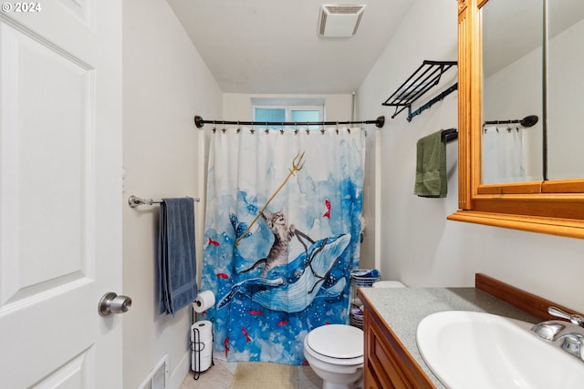 bathroom featuring visible vents, toilet, tile patterned floors, curtained shower, and vanity