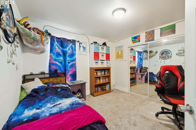 carpeted bedroom with a closet