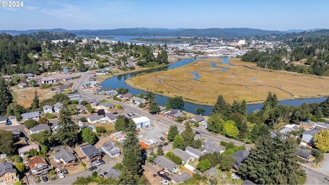 aerial view with a water view and a residential view