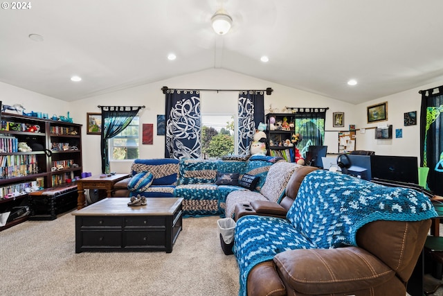 carpeted living room featuring vaulted ceiling and recessed lighting