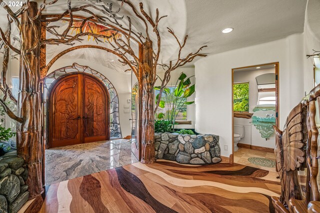 foyer featuring a textured ceiling