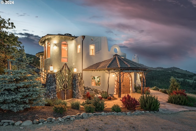 view of front of house featuring a patio