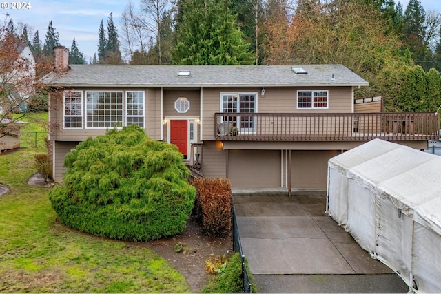 split foyer home featuring a garage