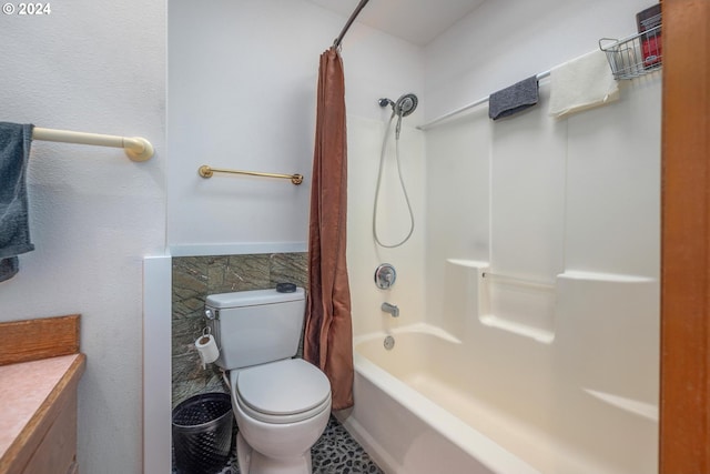 full bathroom featuring vanity, toilet, and shower / tub combo