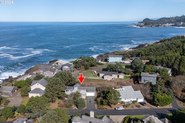 aerial view featuring a water view and a residential view