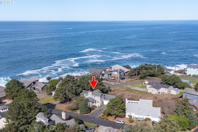 aerial view featuring a residential view and a water view