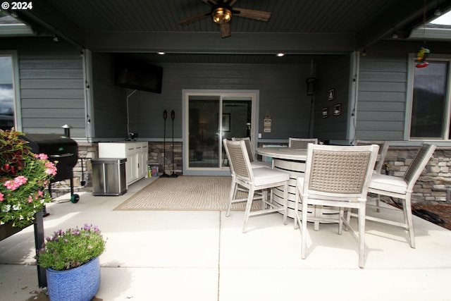 view of patio / terrace with ceiling fan and grilling area