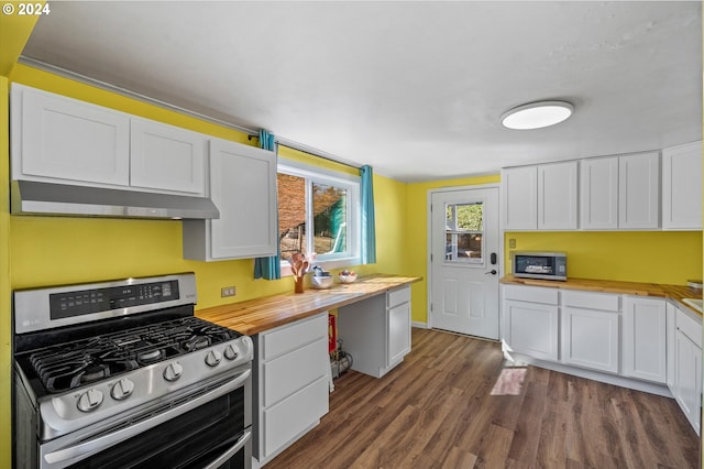 kitchen featuring dark hardwood / wood-style floors, white cabinetry, butcher block counters, and stainless steel appliances