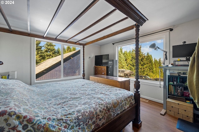 bedroom featuring wood-type flooring