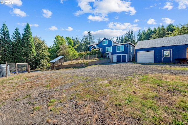 view of yard featuring a garage