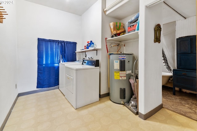 laundry area featuring electric water heater and washer and dryer