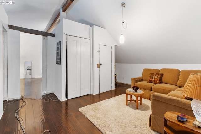 living room with vaulted ceiling with beams and dark wood-type flooring