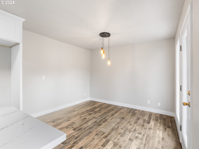 12205 SE 19th Ave, Milwaukie, OR 97222 - unfurnished dining area featuring wood finished floors and baseboards