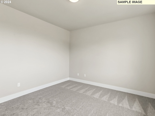 empty room with carpet floors