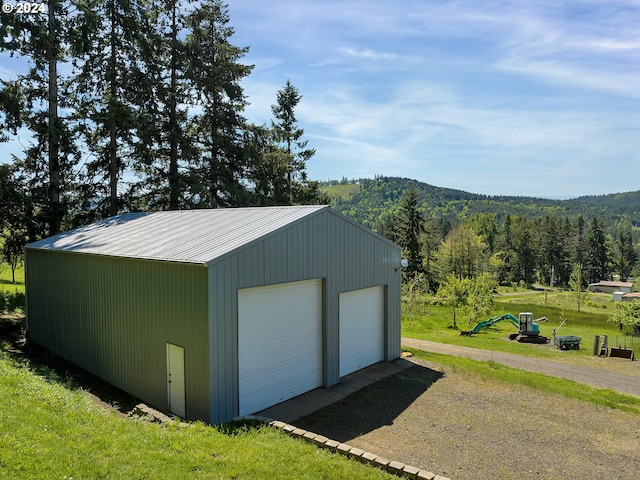 garage featuring a mountain view