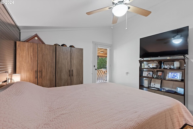 bedroom featuring vaulted ceiling, access to outside, and ceiling fan