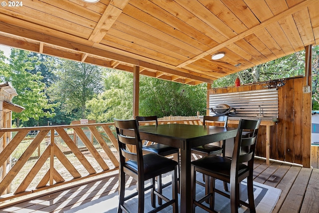 deck with outdoor dining space