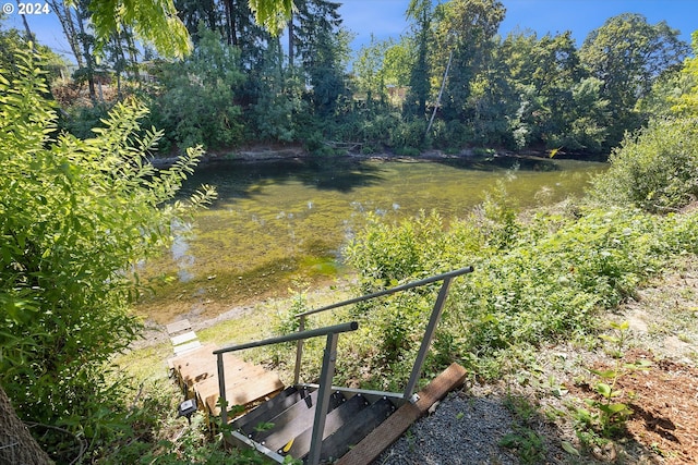 view of yard with a water view