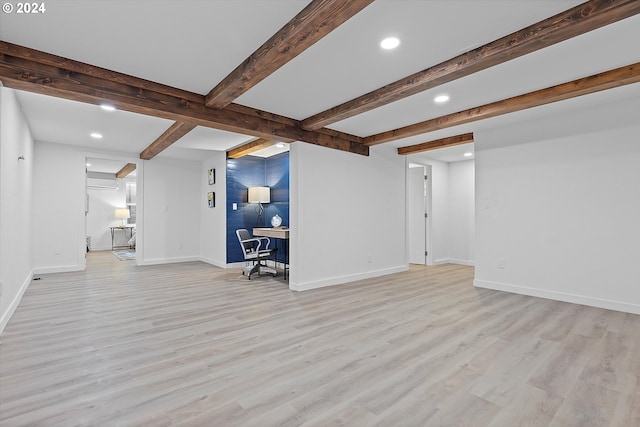 unfurnished living room featuring light hardwood / wood-style floors and beamed ceiling