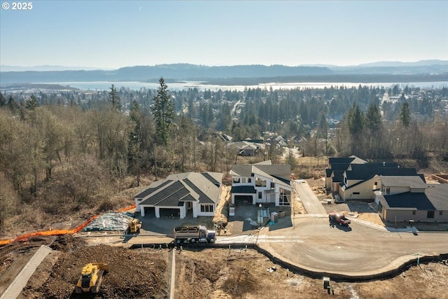 drone / aerial view featuring a mountain view