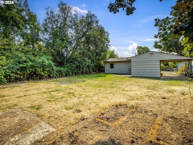 view of yard featuring a carport